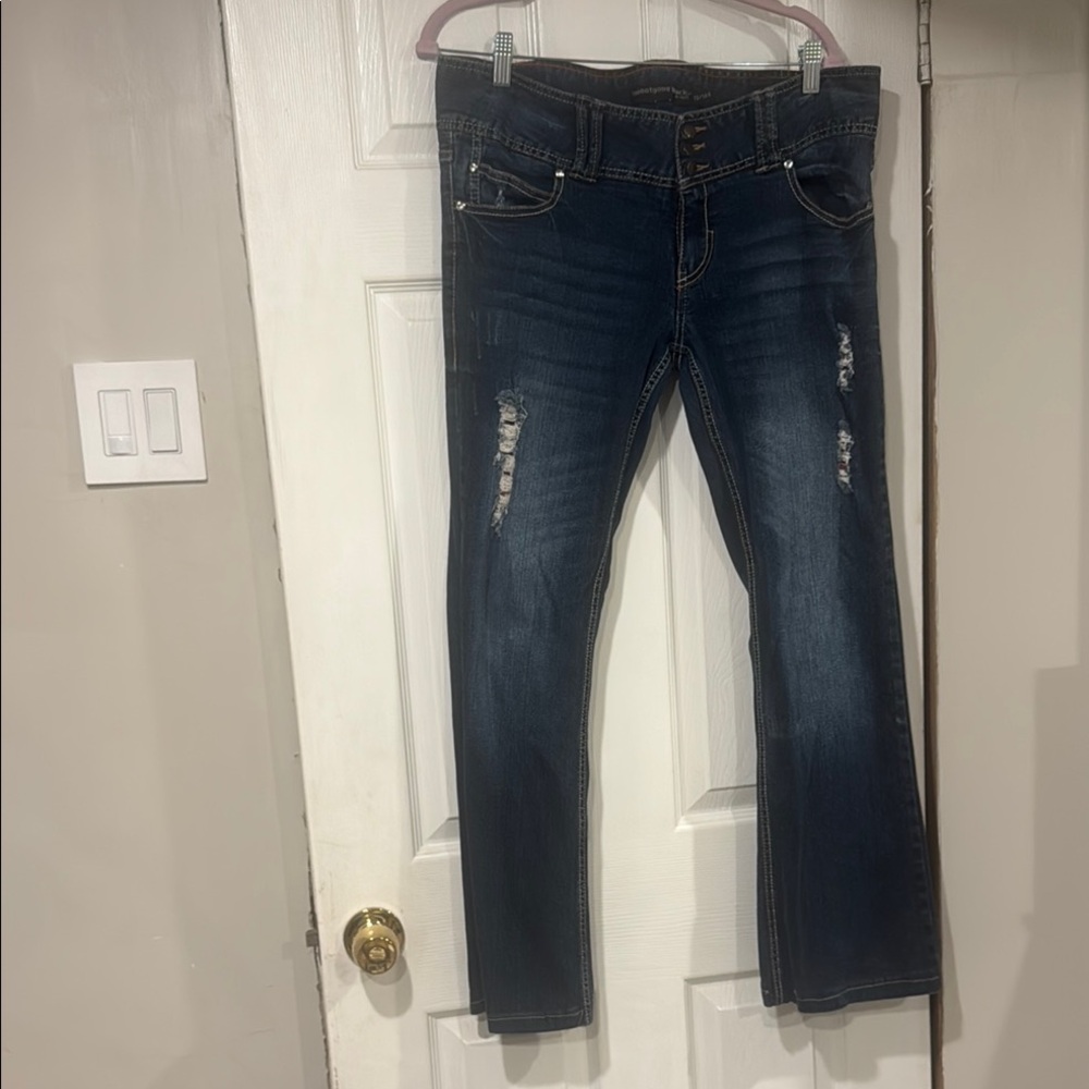 Vintage Blue Flare Jeans with Faded Distressing